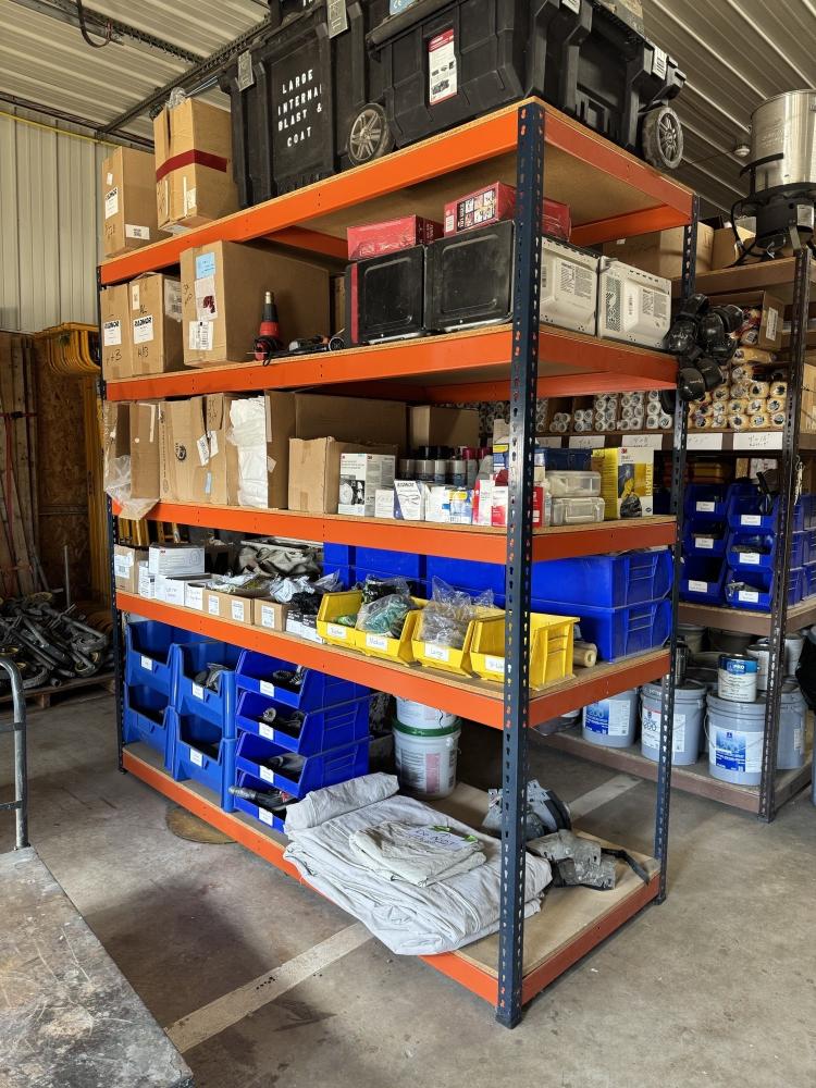 Rivet shelving units installed in MJ Painting Contractor’s warehouse.